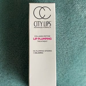 “City Lips” Pluming Treatment Gloss
